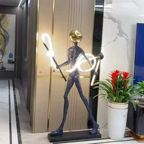 Human Figure Floor Sculpture with Integrated LED Lamp