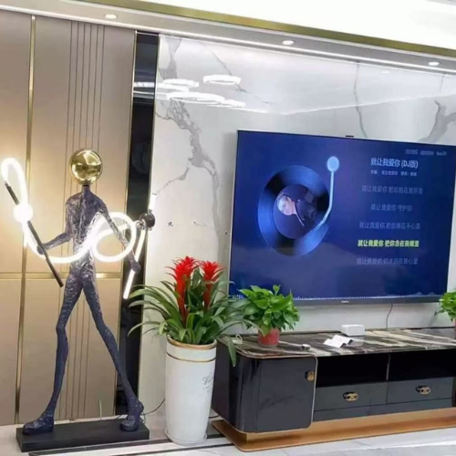 Human Figure Floor Sculpture with Integrated LED Lamp
