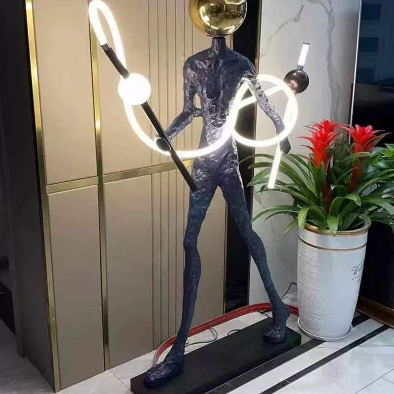 Human Figure Floor Sculpture with Integrated LED Lamp